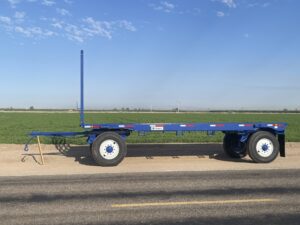 Blue pull type field trailer for towing 