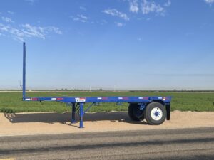 Blue semi type field trailer for towing